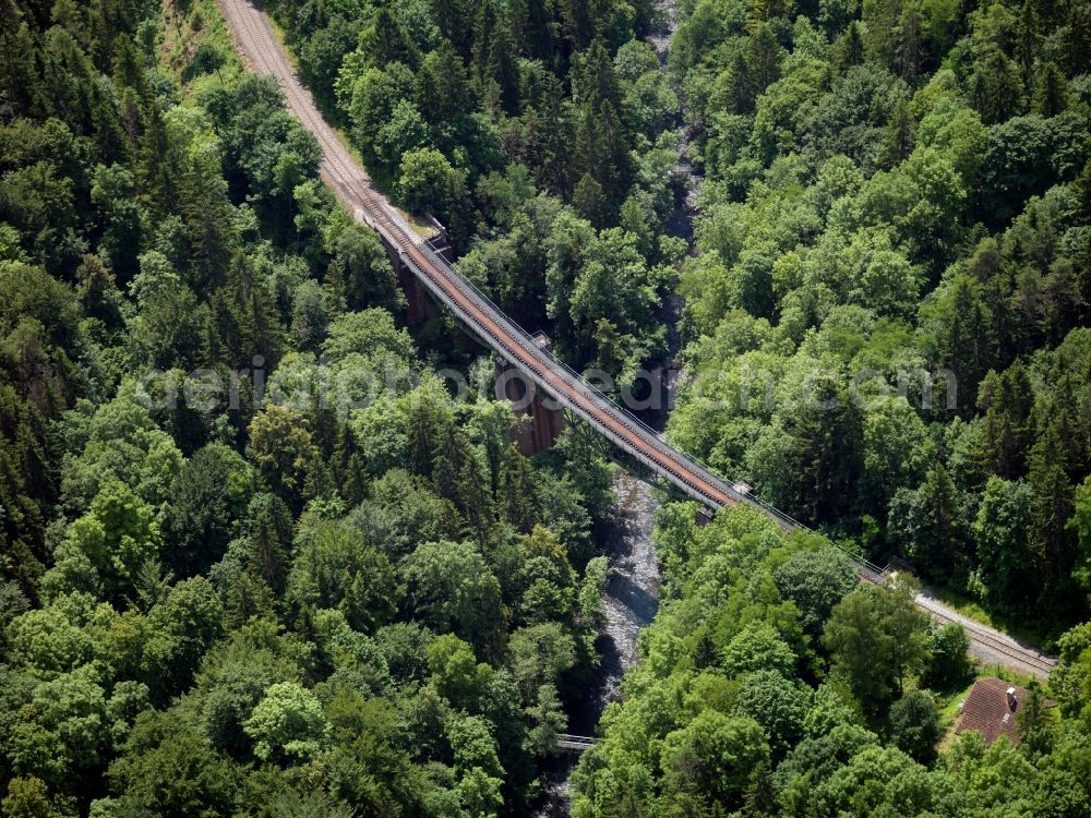 Stühlingen from the bird's eye view: Railroad viaduct near Blumegg in Stuehlingen in the state of Baden-Wuerttemberg. The bridge is part of the Wutach Valley railway, which was opened in 1890. It is a historic landmark of the region. The bridge leads through a forest south of Blumegg across the river Wutach