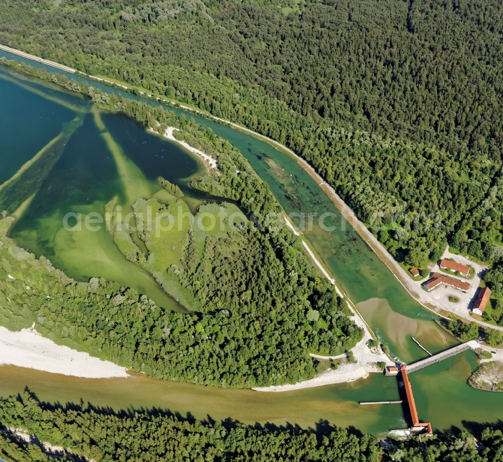 Egling from above - Eisweiher and barrage Ickinger weir in between Isar and Muehltal channel near Icking and Egling in Bavaria. Also known as Ickinger reservoir, the Ickinger pond is a popular destination for nudists