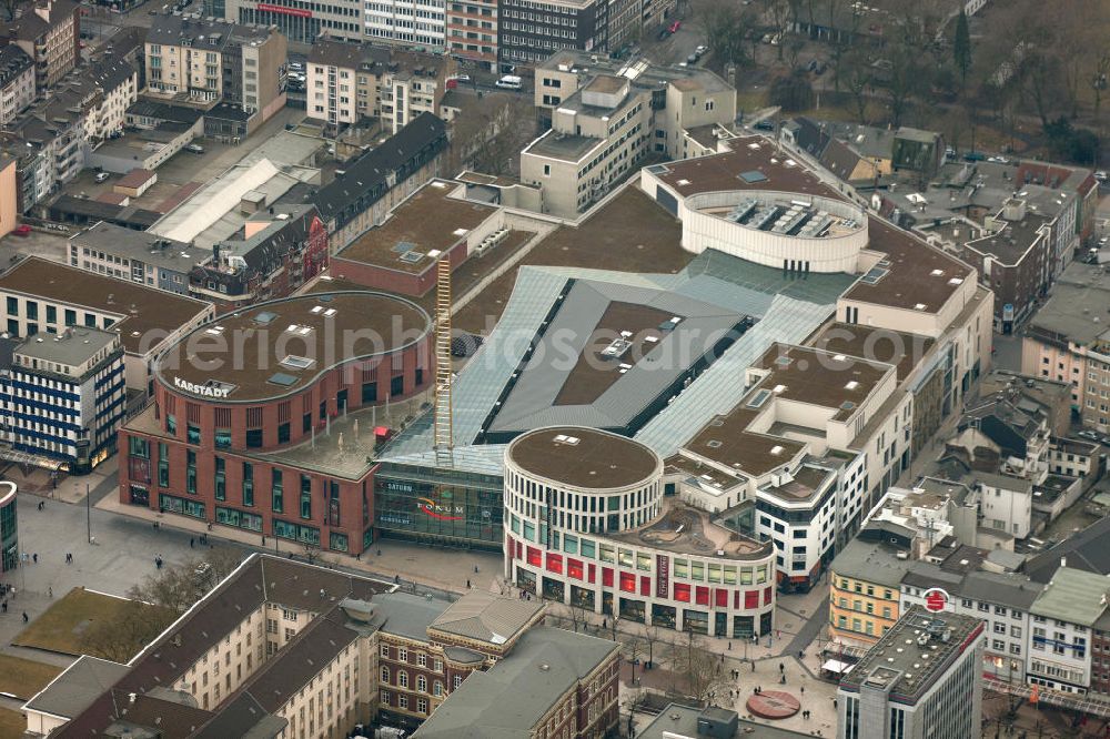 Aerial photograph Duisburg - DUISBURG 02/20/2012 The shopping center shopping center Forum Duisburg. The forum is located at the König-Heinrich-Platz in the center and thus the main pedestrian zone of the city of Duisburg. A special feature is the 65 m high, consisting of hot-dip coated sheet gold golden ladder, the Forum makes recognizable from afar