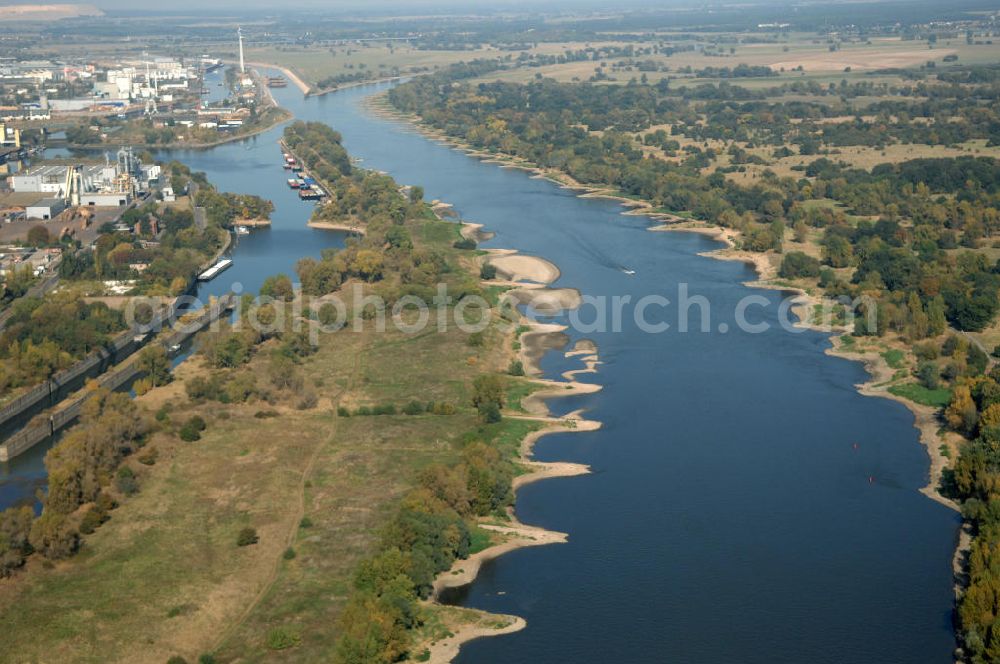 Aerial photograph Magdeburg - Blick auf den Elbe-Abstiegskanal, der den Magdeburger Binnen- Hafen mit der Schleuse Rothensee und dem Mittellandkanal verbindet, wird ausgebaut. Die Bauvorhaben unterstützen die Bestrebungen der Magdeburger Hafengesellschaft, den größten Binnenhafen Mitteldeutschlands zu einer Drehscheibe des internationalen Schiffstransports zu machen. Kontakt WSV: Wasserstraßen-Neubauamt Magdeburg, 39106 Magdeburg, Tel. +49(0)391 535-0, email: wna-magdeburg@wsv.bund.de