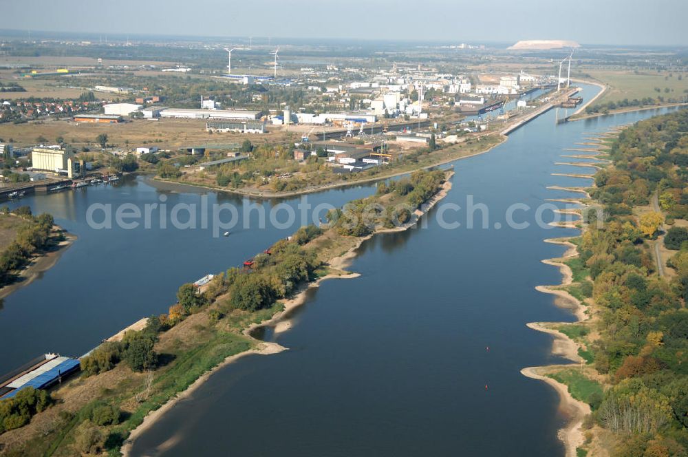 Aerial photograph Magdeburg - Blick auf den Elbe-Abstiegskanal, der den Magdeburger Binnen- Hafen mit der Schleuse Rothensee und dem Mittellandkanal verbindet, wird ausgebaut. Die Bauvorhaben unterstützen die Bestrebungen der Magdeburger Hafengesellschaft, den größten Binnenhafen Mitteldeutschlands zu einer Drehscheibe des internationalen Schiffstransports zu machen. Kontakt WSV: Wasserstraßen-Neubauamt Magdeburg, 39106 Magdeburg, Tel. +49(0)391 535-0, email: wna-magdeburg@wsv.bund.de