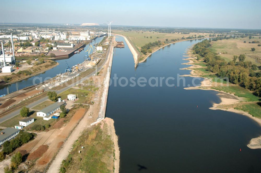 Aerial image Magdeburg - Blick auf den Elbe-Abstiegskanal, der den Magdeburger Binnen- Hafen mit der Schleuse Rothensee und dem Mittellandkanal verbindet, wird ausgebaut. Die Bauvorhaben unterstützen die Bestrebungen der Magdeburger Hafengesellschaft, den größten Binnenhafen Mitteldeutschlands zu einer Drehscheibe des internationalen Schiffstransports zu machen. Kontakt WSV: Wasserstraßen-Neubauamt Magdeburg, 39106 Magdeburg, Tel. +49(0)391 535-0, email: wna-magdeburg@wsv.bund.de