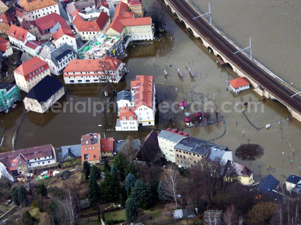 Aerial image Königstein - Flood situation elbe river around and in the area in Koenigstein in the state Saxony, Germany