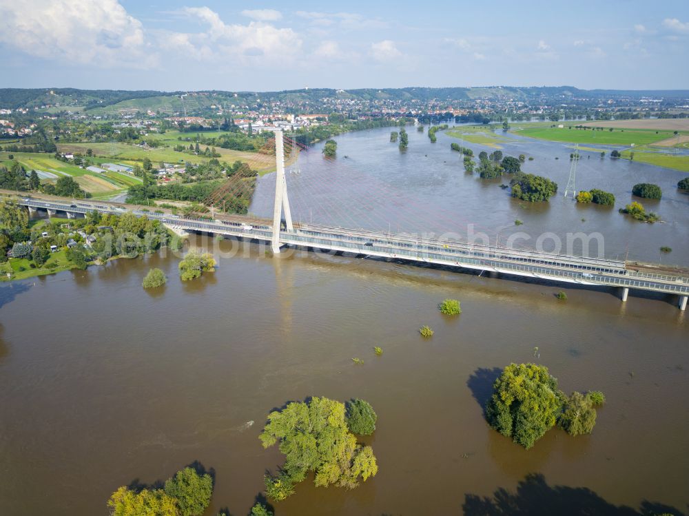 Radebeul from the bird's eye view: River - Bridge structure for crossing the Elbe - Elbe bridge during flooding in the district of Niederwartha in Radebeul in the federal state of Saxony, Germany