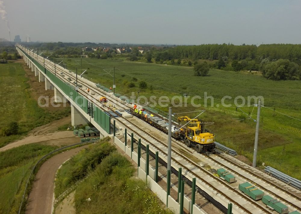 Lochau from above - Electrification work on the rail viaduct of the new ICE line operated by Deutsche Bahn in Lochau in Saxony-Anhalt