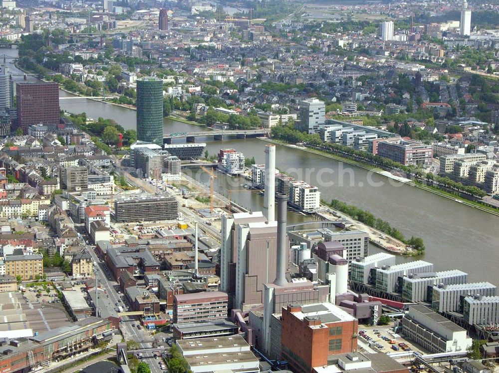 Aerial image Frankfurt - Main / Hessen - Blick auf den Westhafen in Frankfurt/ Main. Im Vordergrund ist das Elektrizitätswerk und im Hintergrund ist der Westhafen Tower zu sehen. Das Elektrizitätswerk wird betrieben von der : Mainova AG, Solmsstraße 38, 60623 Frankfurt am Main Tel.: 069/ 213-02 Fax.: 069 /213-81122