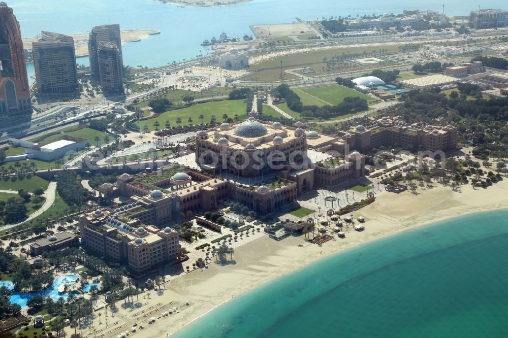 Aerial photograph Abu Dhabi - Emirates Palace Hotel on the peninsula Al Ras Al Akhdar in the Persian Gulf in Abu Dhabi in United Arab Emirates