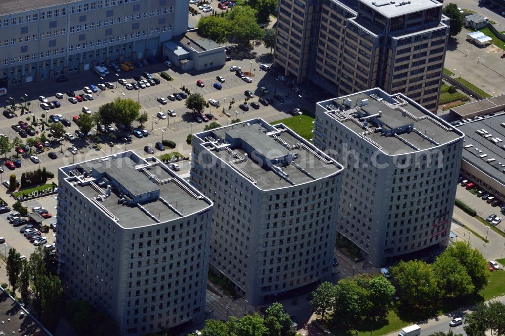 Warschau from the bird's eye view: Empark Business Park in the Mokotow District of Warsaw in Poland. The business park consists of a complex of 9 business and office buildings. Visible here are the three buildings Orion, Sirius and Neptun as well as the central parking lot. The estate is the largest business park in Poland. It was built between 1996 and 2006. It is owned by the Heitman European Property Partners III fund, which was joined by Immoeast