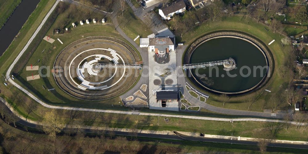 Bottrop from above - View the former sewage treatment plant BernePark. By Emschergenossenschaft the decommissioned wastewater treatment plant was converted into a park. The two clarifiers are converted from landscape artists