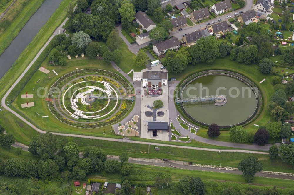 Aerial photograph Bottrop - View the former sewage treatment plant BernePark. By Emschergenossenschaft the decommissioned wastewater treatment plant was converted into a park. The two clarifiers are converted from landscape artists