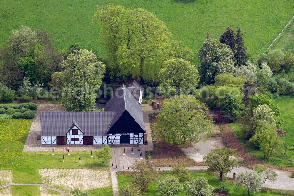 Aerial photograph Holzwickede - View of the Emscherquellhof in Holzwickede in the state North Rhine-Westphalia. The Emscherquellhof is a timber-framed farm in the west of the Hixterwald