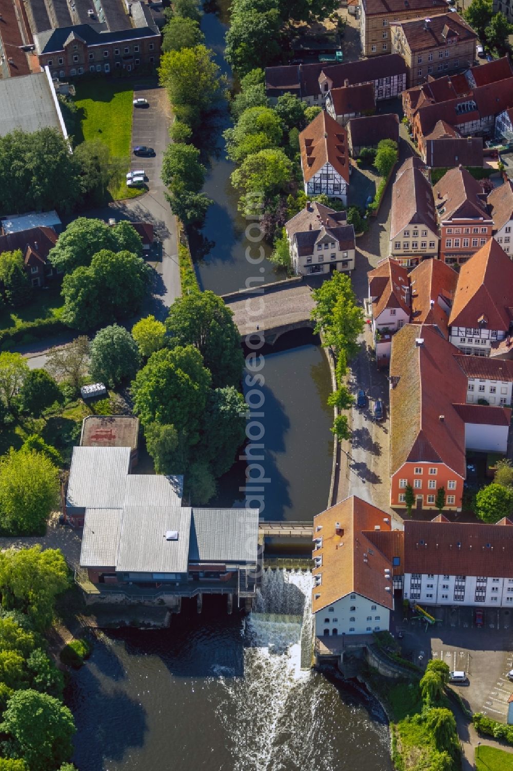 Aerial image Warendorf - The weir on the Ems in Warendorf in the state North Rhine-Westphalia. On the weir at the building of the Emsmuehle is a bridge for pedestrians and behind is the Muehlenkolk 