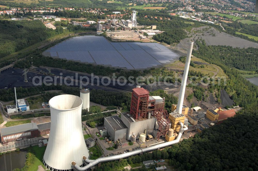 Aerial image Göttelborn - Blick auf die Energiversorgungsanlage. Eine Kombination aus Steikohlekraftwerk und Photovoltaikanlage. Im Jahr 2000 wurde das Bergwerk Göttelborn stillgelegt, auf dem ehemaligen Absinkweiher werden bis Ende des Jahres 50.000 Solarmodule aufgestellt, damit ist es die größte Photovlotaikanlage der Welt. Kontakt: energis GmbH, Heinrich-Böcking-Straße 10 - 14, 66121 Saarbrücken, Tel. 0681 / 9069 0, service@energis.de,