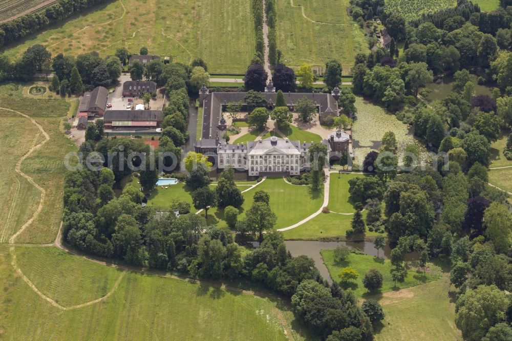 Aerial image Düsseldorf - View of the English landscape garden, with the castle in the district of Düsseldorf Heltorf Angermund in the state of North Rhine-Westphalia. The castle was built for the management of agricultural and forestry products in the environment. There is a moated castle. Forestry is in the area since the 12th Century operated