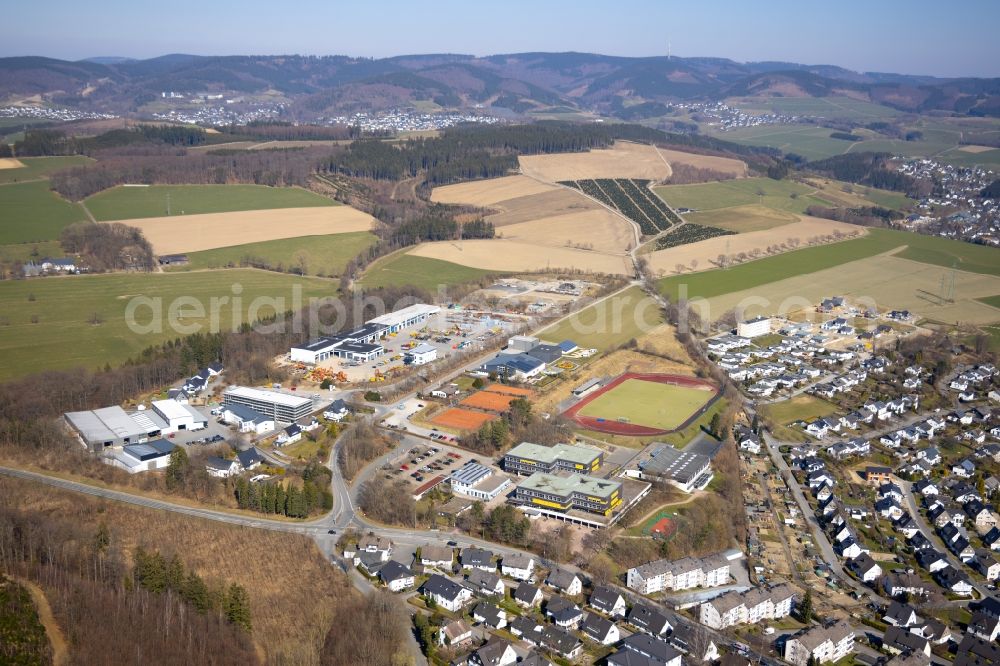 Schmallenberg from the bird's eye view: Ensemble of sports grounds on Christine-Koch-Schule along the Obringhauser Strasse in Schmallenberg in the state North Rhine-Westphalia, Germany