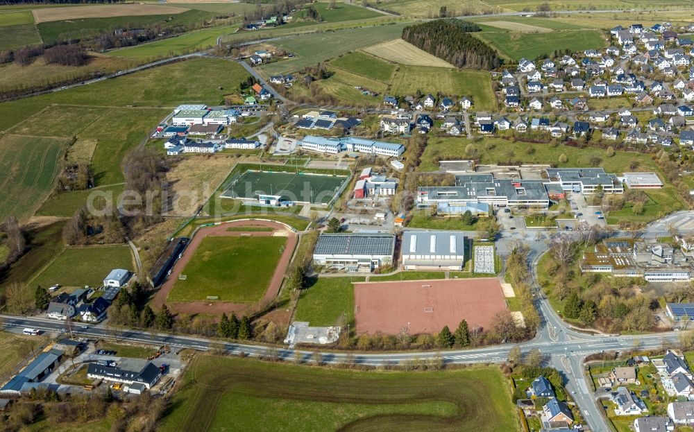 Aerial image Brilon - Ensemble of sports grounds and the building complex of the Heinrich-Luebke-Schule in Brilon in the state North Rhine-Westphalia, Germany