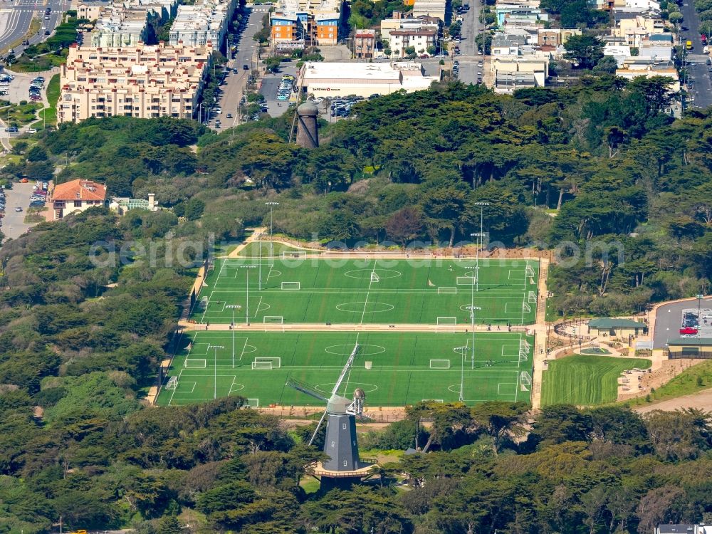 Aerial image San Francisco - Ensemble of sports grounds with historic windmills in San Francisco in California, USA