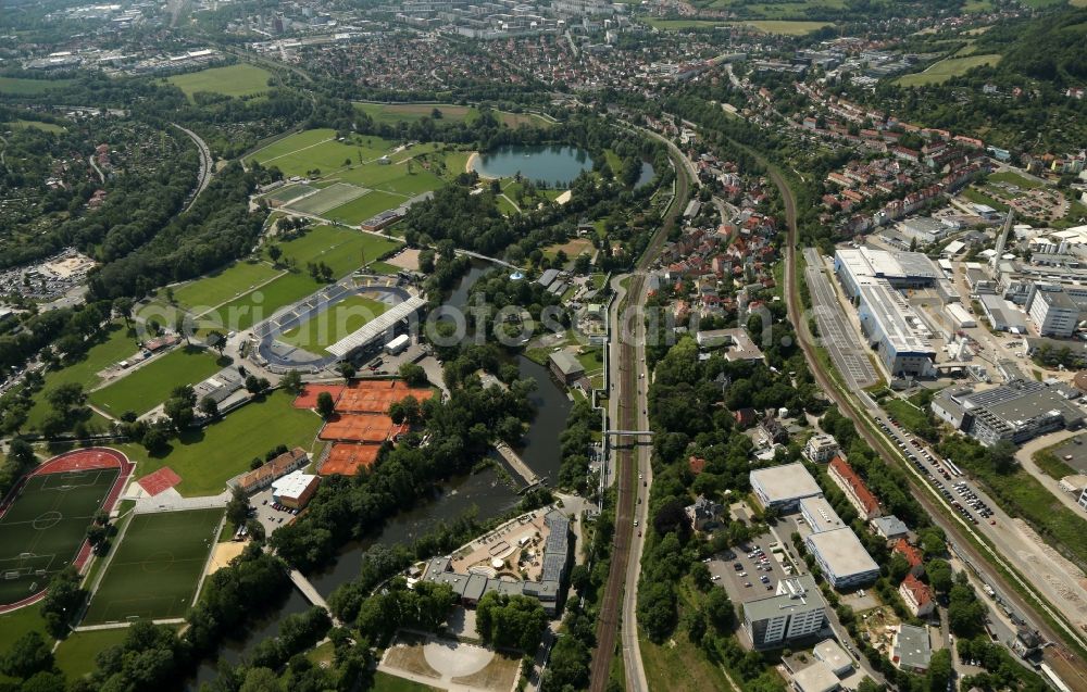 Jena from above - Ensemble of sports grounds and the industrial area along the Saale and the course of the rails in the district Wenigenjena in Jena in the state Thuringia, Germany