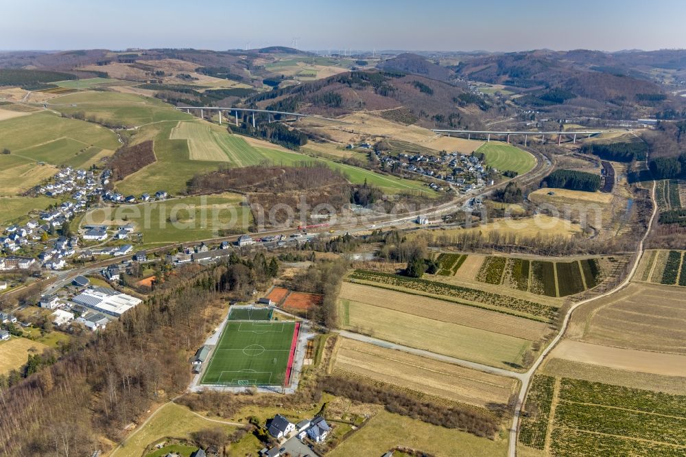 Ostwig from the bird's eye view: Ensemble of sports grounds on street Auf dem Schilde in Ostwig at Sauerland in the state North Rhine-Westphalia, Germany