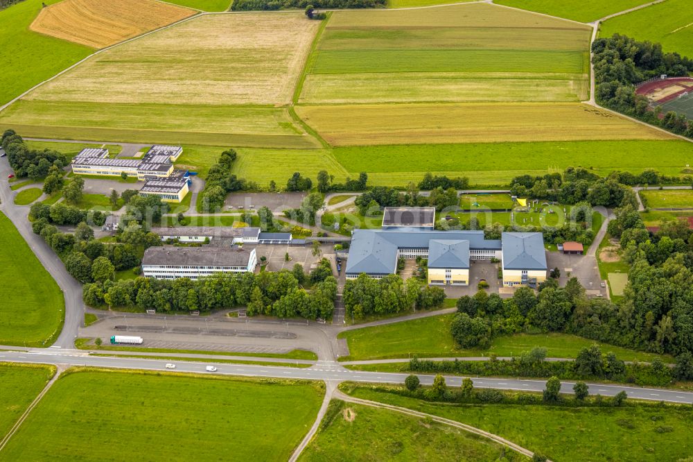 Bad Berleburg from above - Ensemble of sports grounds and Rothaarbad Am Sportfeld in the district Am Stoeppelsweg in Bad Berleburg at Siegerland in the state North Rhine-Westphalia, Germany