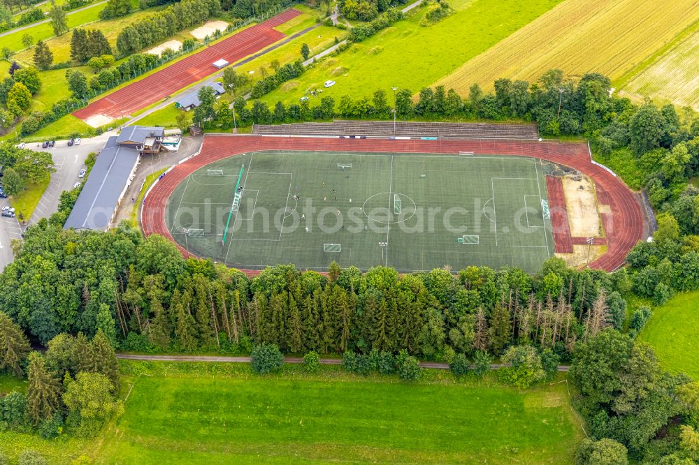 Aerial photograph Bad Berleburg - Ensemble of sports grounds and Rothaarbad Am Sportfeld in the district Am Stoeppelsweg in Bad Berleburg at Siegerland in the state North Rhine-Westphalia, Germany