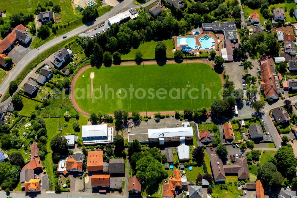 Vöhl from the bird's eye view: Ensemble of sports grounds in Voehl in the state Hesse, Germany