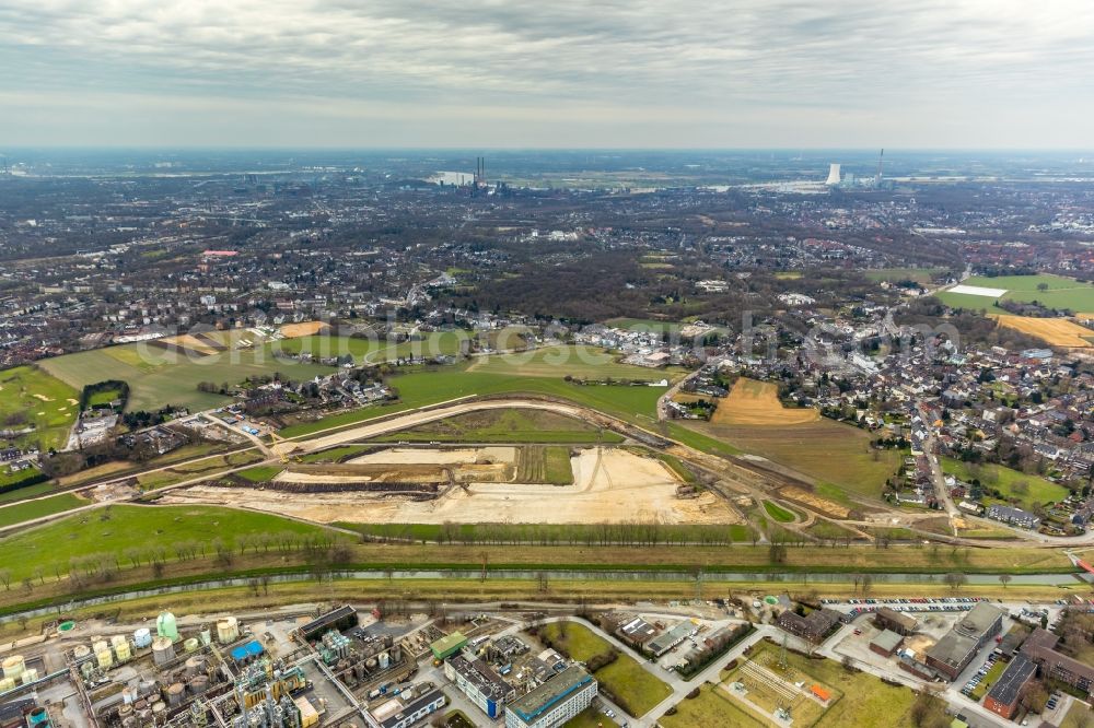 Oberhausen from above - Development area and building land fallow with a construction site of EMSCHERGENOSSENSCHAFT / LIPPEVERBAND at Holtener Bruch in Oberhausen in the state North Rhine-Westphalia, Germany