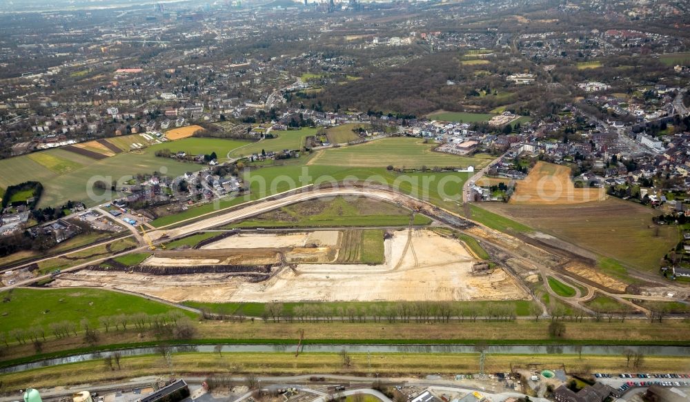 Oberhausen from the bird's eye view: Development area and building land fallow with a construction site of EMSCHERGENOSSENSCHAFT / LIPPEVERBAND at Holtener Bruch in Oberhausen in the state North Rhine-Westphalia, Germany