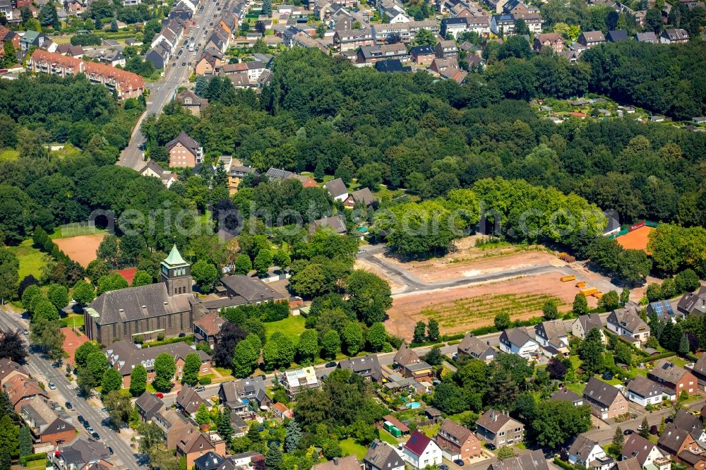 Aerial image Bottrop - Development area and empty lot at Ludgerus church in the Fuhlenbrock part of Bottrop in the state of North Rhine-Westphalia