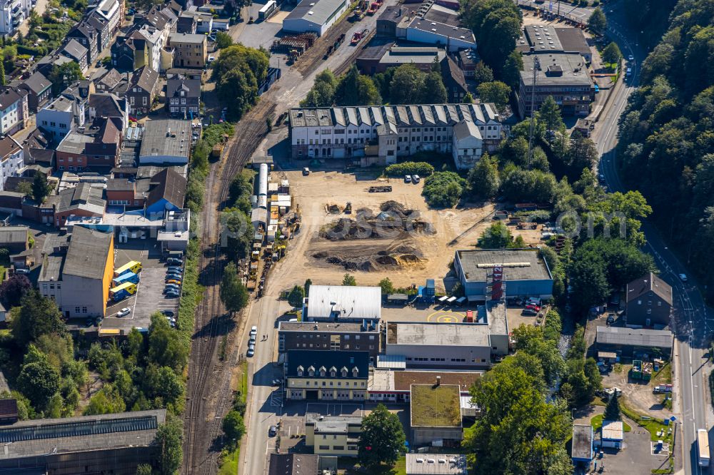 Ennepetal from the bird's eye view: Development area and building land fallow neben of Feuer- and Rettungswache on Wehrstrasse in Ennepetal in the state North Rhine-Westphalia, Germany