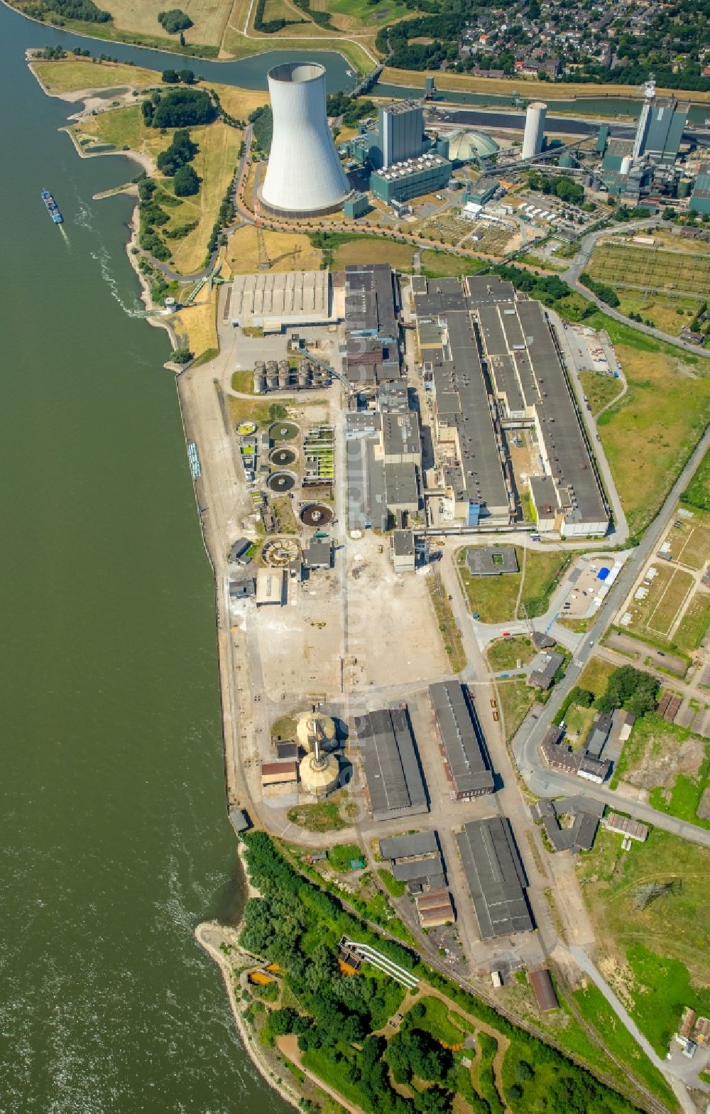 Duisburg from above - Development area of former industrial and commercial area of of Duisburger Hafen AG Logport VI 6 on Rhine river in Duisburg in the state North Rhine-Westphalia, Germany