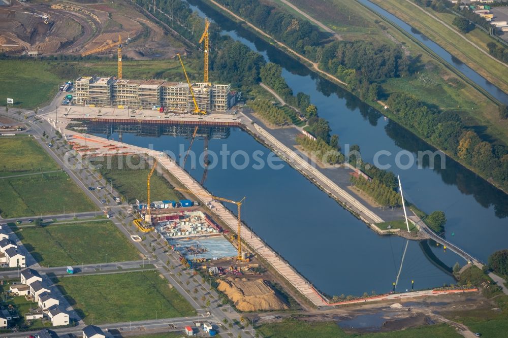 Aerial image Gelsenkirchen - Development area of NRW.URBAN Service GmbH on the Graf Bismarck Hafenviertel at the Rhein-Herne-Kanal in the district Bismarck in Gelsenkirchen in the state North Rhine-Westphalia