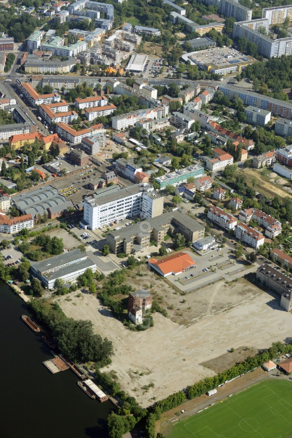 Aerial photograph Berlin - Development area of industrial wasteland on the area of the former Funktechnikwerkes am Ufer der Dahme in Koepenick in Berlin in Germany