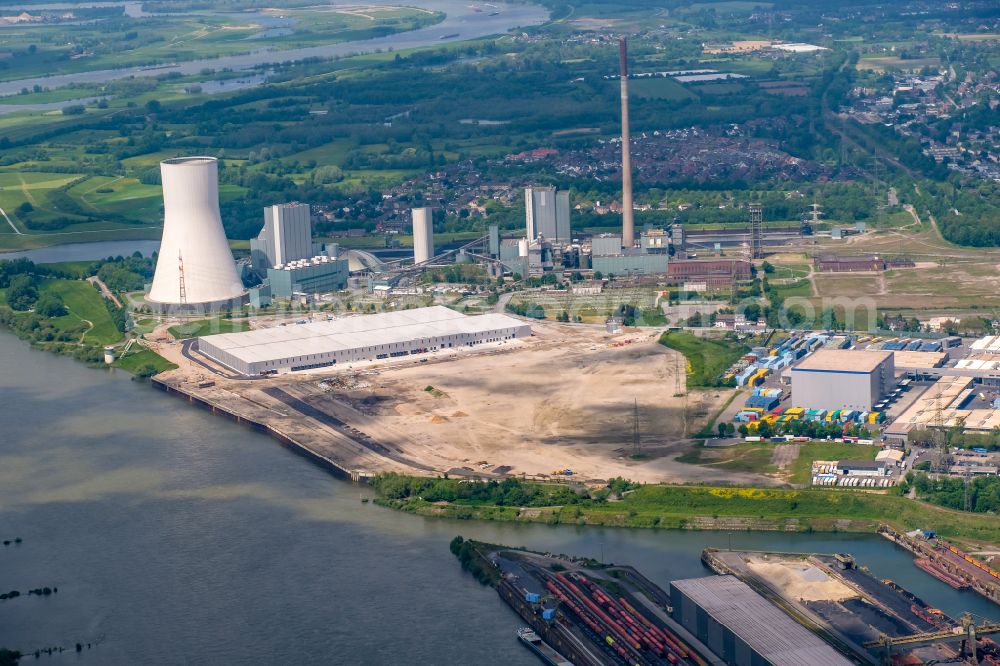 Duisburg from the bird's eye view: Development area of industrial wasteland Logport VI on shore of rhine river on destrict Walsum in Duisburg in the state North Rhine-Westphalia, Germany