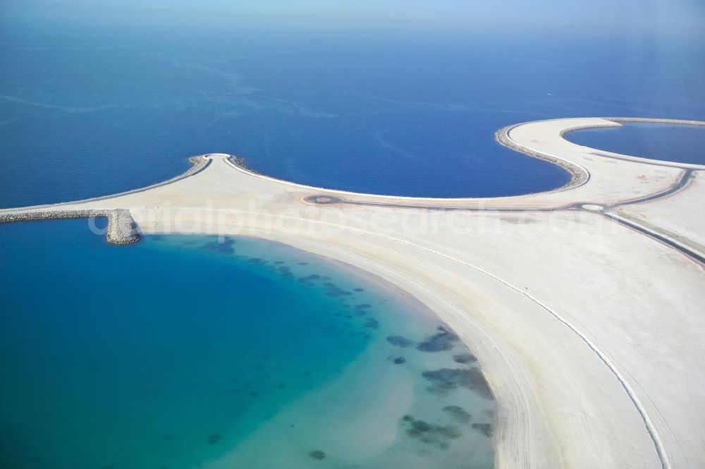 Ras Al Khaimah from the bird's eye view: Al Marjan Island is an artificial archipelago in the arab emirate Ras Al Khaimah. It is part of the Al Hamra Village Project. In the future, the archipelago is meant to be the arterial road for the region's tourism