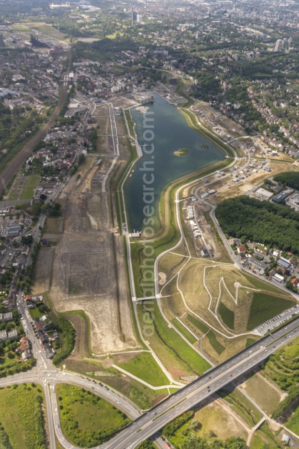 Dortmund from the bird's eye view: View of the development area Phoenix Lake in Dortmund. With the flooding of the lake in the Phoenix suburb Hörde on the former site of the former Hermannshütte a new way of urban development was created in this former industrial area