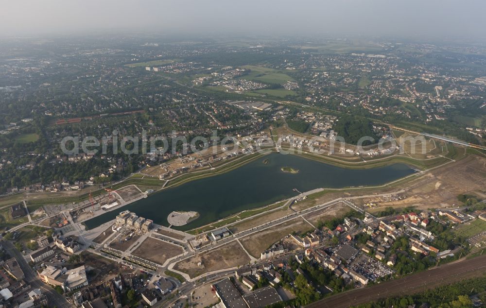 Dortmund from the bird's eye view: View of the development area Phoenix Lake in Dortmund. With the flooding of the lake in the Phoenix suburb Hörde on the former site of the former Hermannshütte a new way of urban development was created in this former industrial area