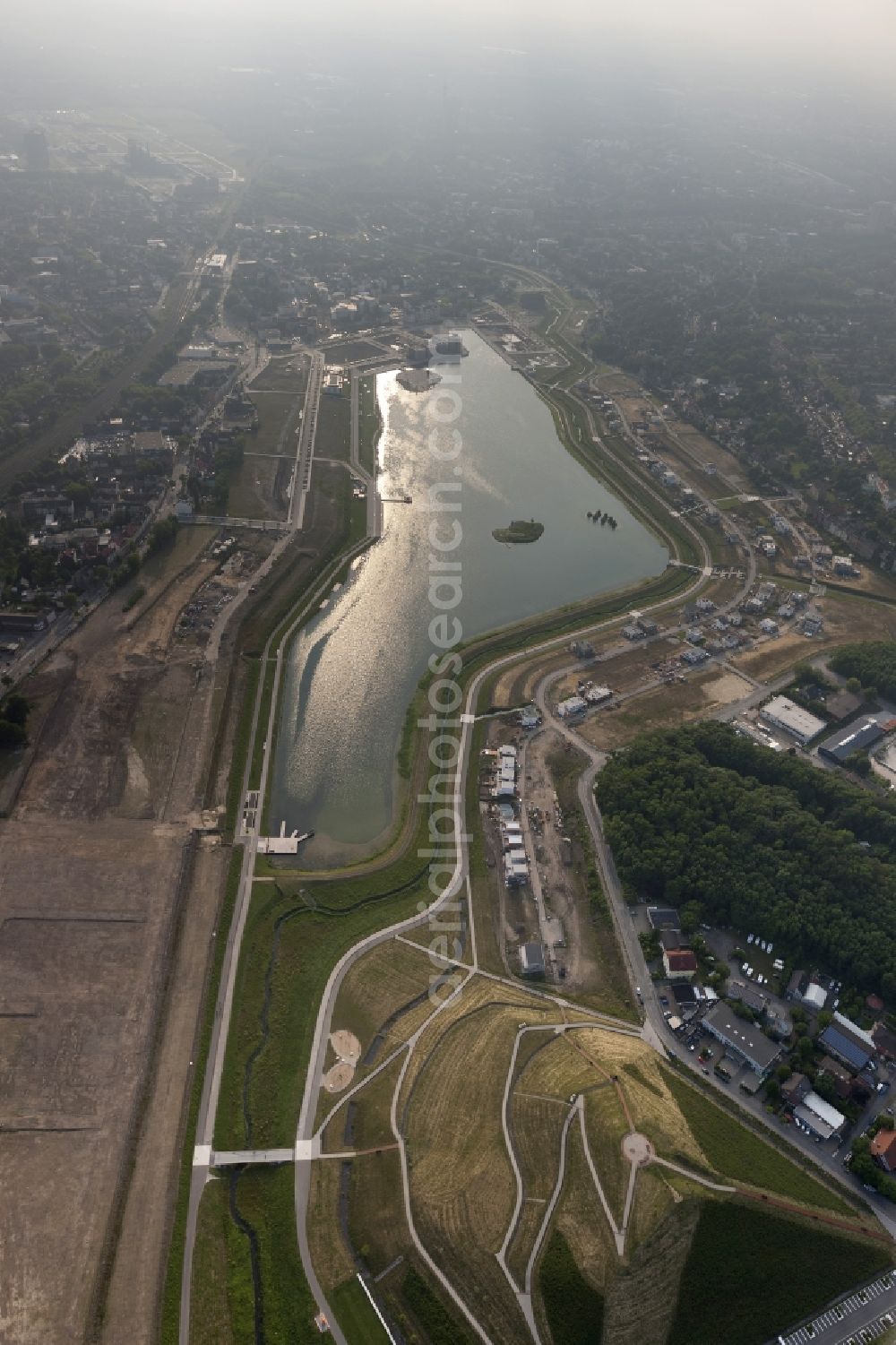 Aerial image Dortmund - View of the development area Phoenix Lake in Dortmund. With the flooding of the lake in the Phoenix suburb Hörde on the former site of the former Hermannshütte a new way of urban development was created in this former industrial area