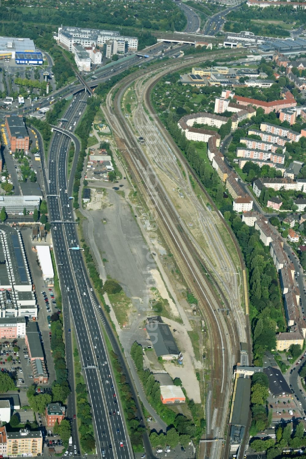 Berlin from the bird's eye view: Development area of the decommissioned and unused land and real estate on the former marshalling yard and railway station of Deutsche Bahn in the district Tempelhof-Schoeneberg in Berlin, Germany