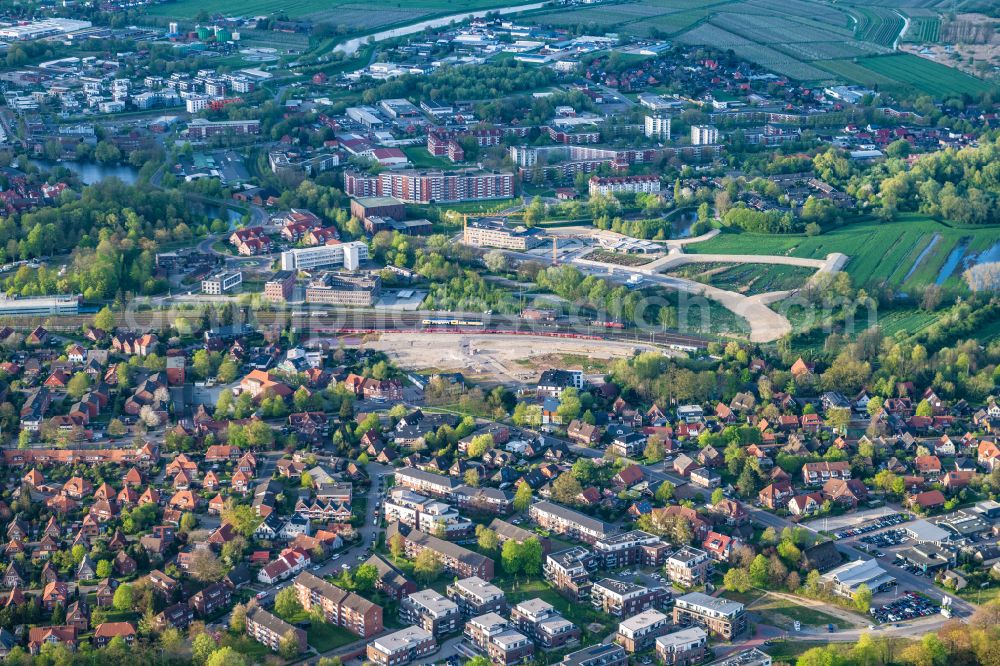 Aerial photograph Stade - Developing field of residential and commercial space Am Gueterbahnhof in Stade in the state Lower Saxony, Germany