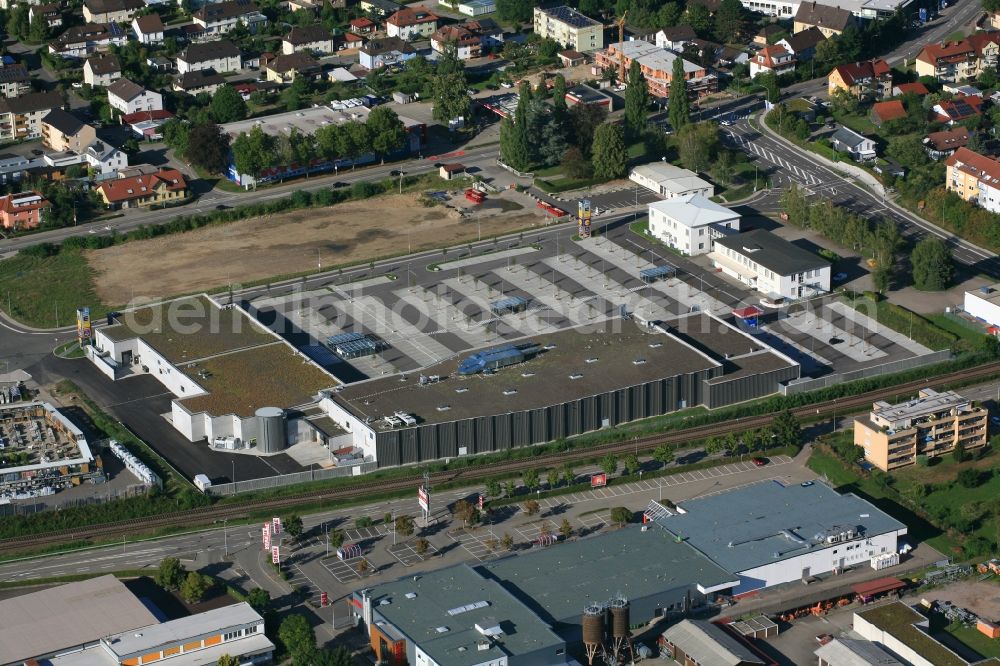 Aerial image Bad Säckingen - Developing field of residential and commercial space and empty parking space at Sunday at Brennet Park in Bad Saeckingen in the state Baden-Wurttemberg, Germany