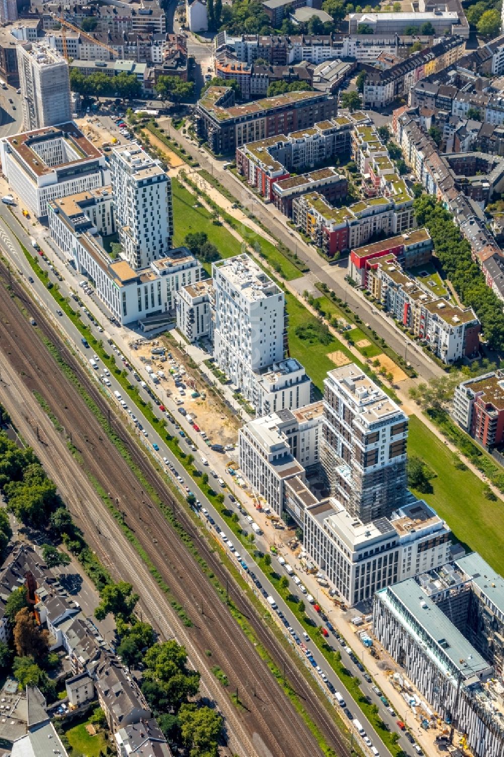 Düsseldorf from the bird's eye view: Developing field of residential and commercial space with new construction projects and construction sites along the Toulouser Allee in Duesseldorf in the state North Rhine-Westphalia, Germany