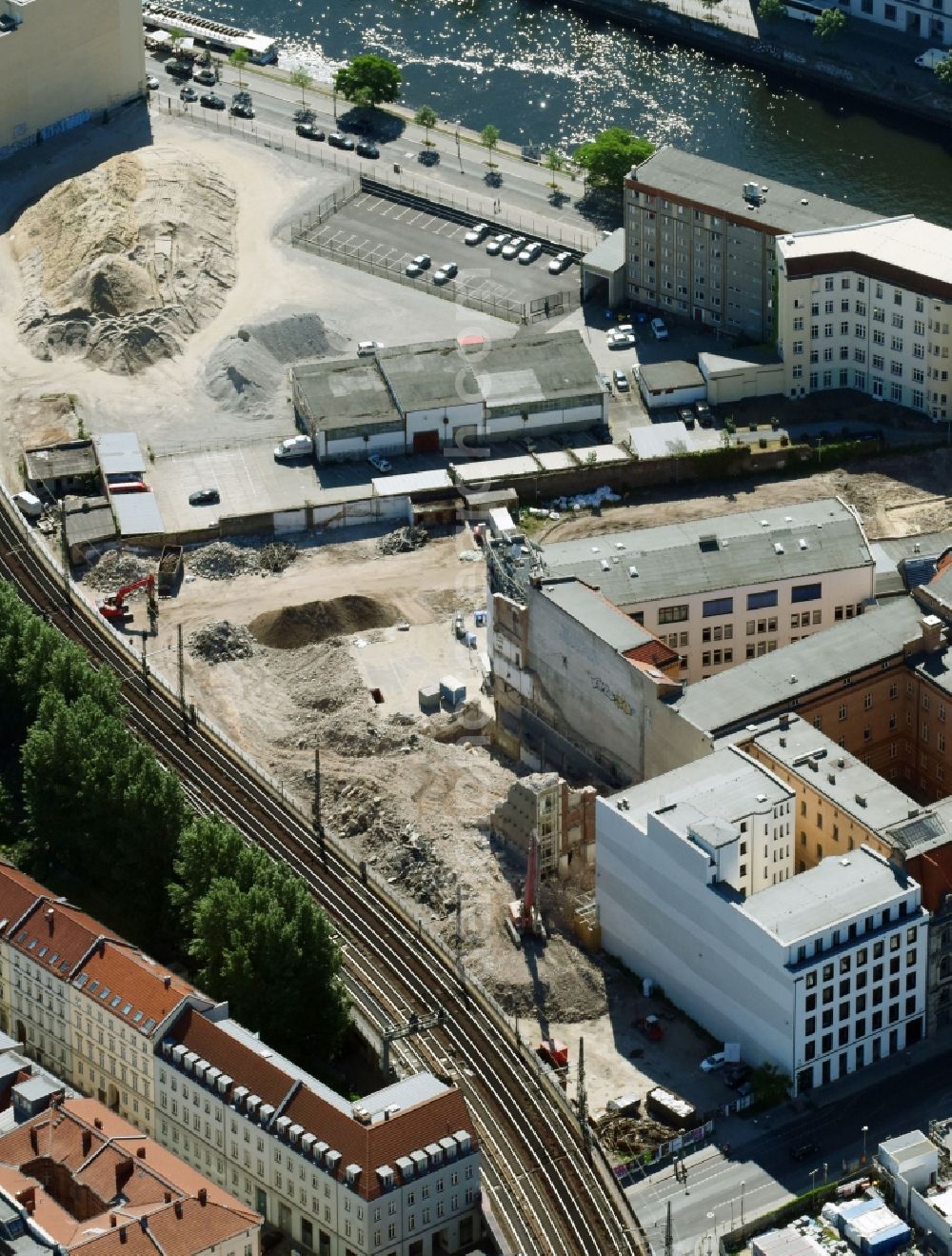 Berlin from the bird's eye view: Developing field of residential and commercial space on Schiffbauerdamm on Spree river in the district Mitte in Berlin, Germany