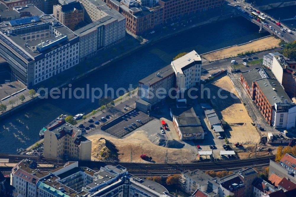 Berlin from above - Developing field of residential and commercial space on Schiffbauerdamm on Spree river in the district Mitte in Berlin, Germany