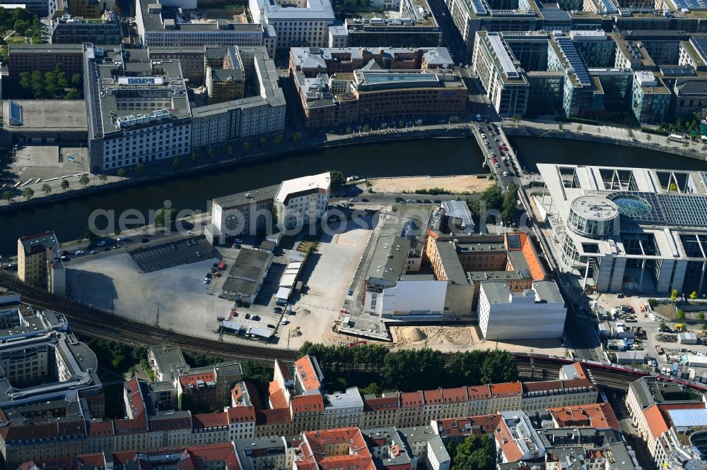 Berlin from above - Developing field of residential and commercial space on Schiffbauerdamm on Spree river in the district Mitte in Berlin, Germany