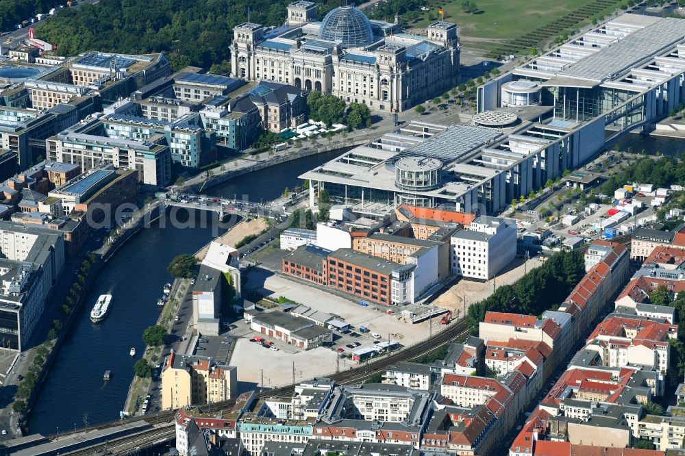 Berlin from above - Developing field of residential and commercial space on Schiffbauerdamm on Spree river in the district Mitte in Berlin, Germany