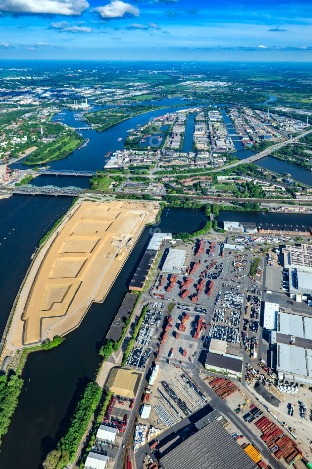 Hamburg from above - Demolition work on the site of the former logistics center ruin Ueberseezentrum on Schuhmacherwerder - Moldauhafen in the district Kleiner Grasbrook in Hamburg, Germany