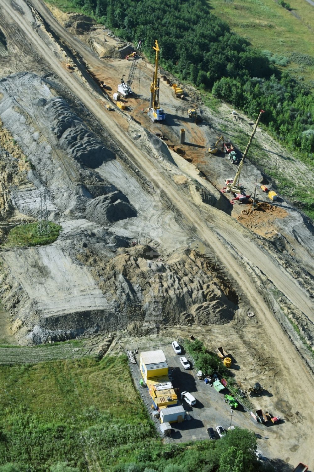 Espenhain from the bird's eye view: Excavation and surface solidification holes along the motorway route and of the route route B95 to A72 motorway in Espenhain in Saxony