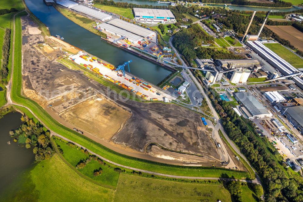 Voerde (Niederrhein) from above - Earthworks for the expansion of the container terminal in the container port of the Emmelsum inland port in Voerde (Lower Rhine) in the Ruhr area in the state of North Rhine-Westphalia, Germany