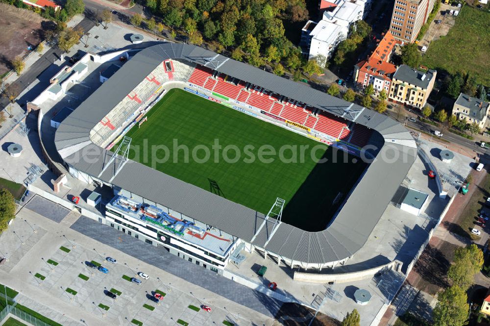 Aerial photograph Halle / Saale - Der Erdgas Sportpark in Halle / Saale ( vorher Kurt-Wabbel- Stadion ) wurde neu saniert. Das neue Stadion ist mit einer Flutlichtanlage ausgestattet und hat außer den Zuschauerplätzen, VIP-Logen und einen Business Bereich. The Erdgas Sportpark in Halle / Saale was refurbished. The new stadium has floodlights, VIP-lodges and a business area.